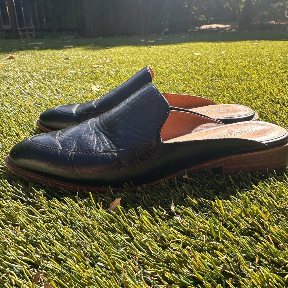 Black leather mules